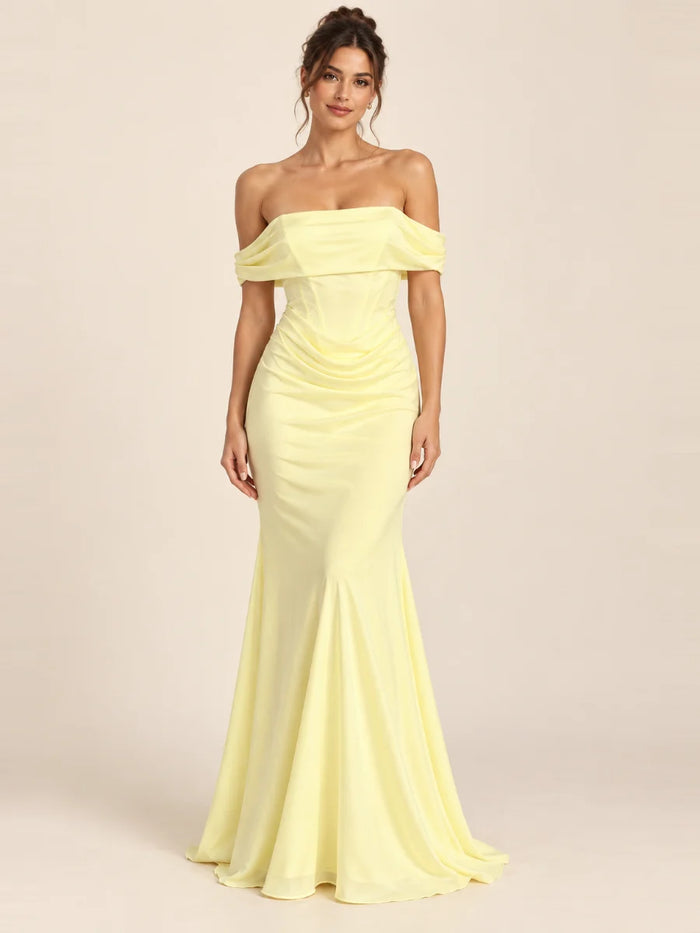 Vestido de grado y fiesta hombros caídos y silueta sirena en color amarillo, nuevo ingreso de la colección 2026 de Casa París en modelo virtual