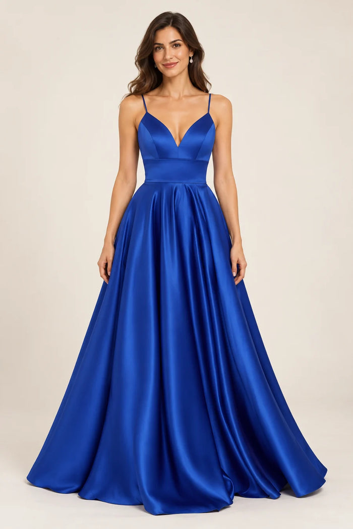 Vestido de fiesta azul rey con escote en V y falda amplia, colección 2026 en modelo virtual